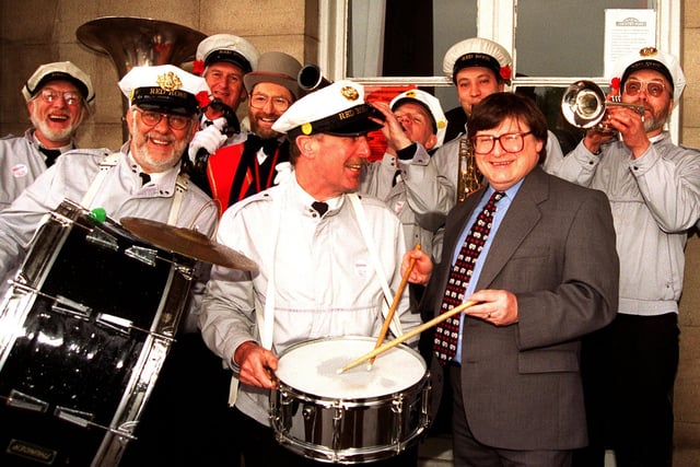 Yes Minister Ian McCartney drumming up support with the lads from the Red Rose Jaz Band who entertained at the May Day Rally at Haigh Hall