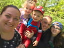 Oliver Wood with his wife, Gemma and their children.