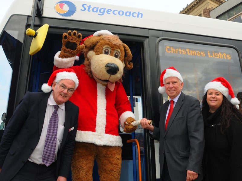 Transport company Stagecoach were the main sponsors for this year's Wigan Christmas Lights Switch-On. From left: John Sanson centre manager at Grand Aracde shopping centre, Wigan town centre mascot Wiggy, Chris Bowles managing director of Stagecoach and Victoria Nichol centre manager at The Galleries shopping centre, pictured in Wigan town centre