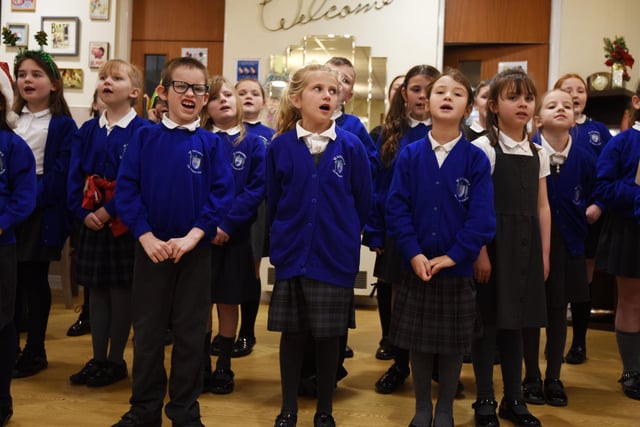 Pupils from the St Catharine's School Choir perform Christmas songs.