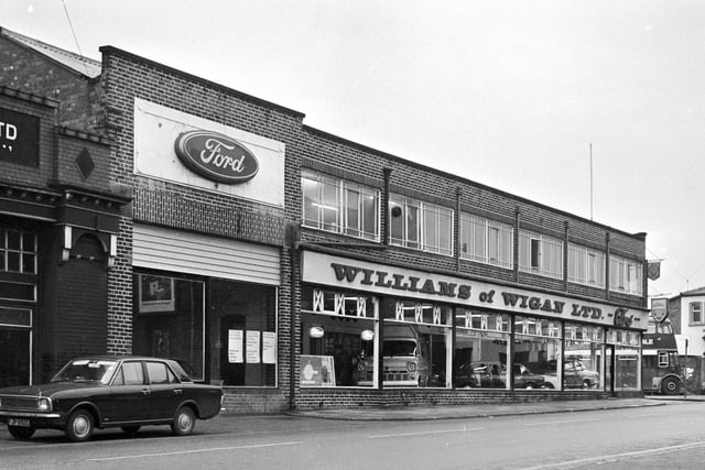 Williams of Wigan Ford cars showroom on Wallgate at the junction with Miry Lane in November 1968. A double decker Ribble bus can be seen emerging from Miry Lane where the depot was situated.
