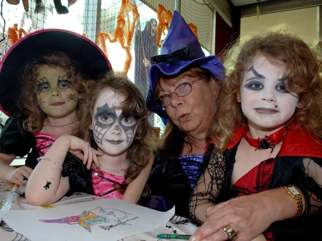 Enjoying a spooky Halloween party at Asda in Wigan are Barbara Heyes with Esther, Jessica, and Melissa Brojerdi