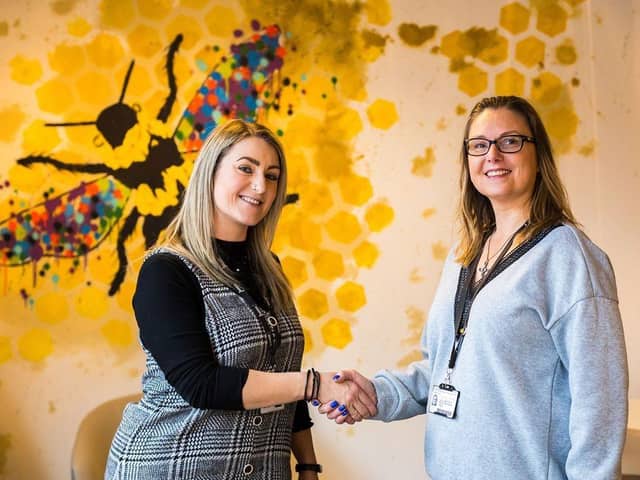 Hannah Flemming from Truline Construction pictured with Louise White from MMU