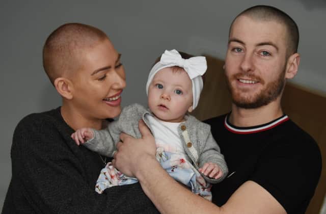 Estelle Wignall and husband Mike with their daughter Brooke, pictured last year