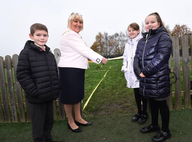 The Mayor of Wigan Coun Marie Morgan joins members of the school eco-council at the opening of the Queen Elizabeth II Remembrance Garden, with trees planted in memory of loved ones, inspired by Queen Elizabeth II and the Queen's green canopy project