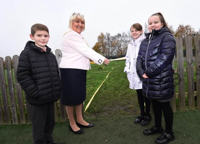 The Mayor of Wigan Coun Marie Morgan joins members of the school eco-council at the opening of the Queen Elizabeth II Remembrance Garden, with trees planted in memory of loved ones, inspired by Queen Elizabeth II and the Queen's green canopy project