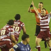 Harry Smith kicked the winning drop-goal in Wigan Warriors' victory over Hull FC