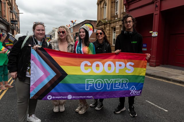 Wigan Pride parade through the streets of Wigan