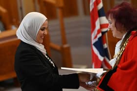 The Mayor of Wigan Coun Debbie Parkinson presents certificates at the monthly British Citizenship ceremony, held in the Council Chambers at Wigan Town Hall.