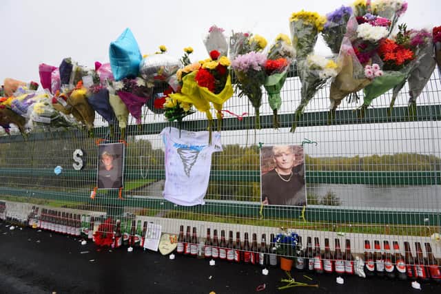 Flowers and tributes in memory of Samson Price left on the A49 link road bridge overlooking Westwood Flash where the teenager died