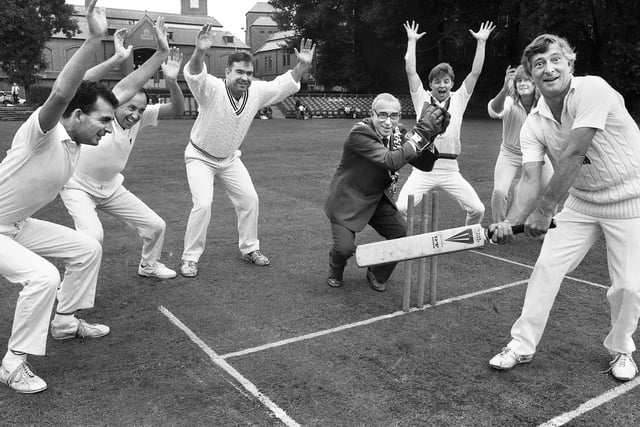 Wigan MP Roger Stott looks stumped by Wigan Mayor, Coun. Ronald McAllister, at the launch of Wigan Cricket Festival on the Mesnes Playing Field on Saturday 1st of September 1990.