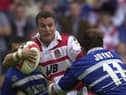 Pic...Ben Duffy...Wigan v St Helens.....09/07/2000..Copyright>>Simon Wilkinson..Wigan's Willie Peters tries to escape St Helen's Chris Joynt..