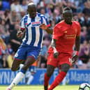 Sanmi Odelusi in action for Latics during a pre-season friendly against Liverpool in 2016