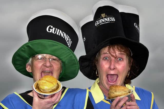 2004 - Edward's Bakery staff members, Moira Hughes and Moira Mason, try out the Irish Stew pies which will be on sale for St. Patrick's Day.