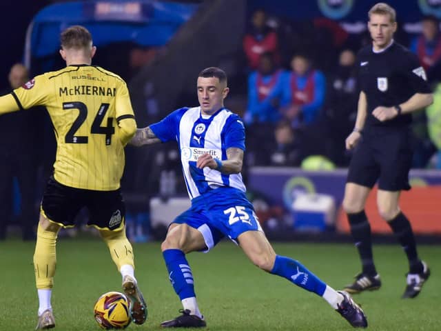 Ollie Norburn gets stuck in on his full Latics debut against Burton in midweek