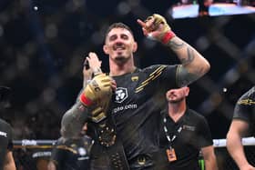 Tom Aspinall celebrates in the octagon after his quickfire stopping of Curtis Blaydes