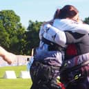 Helen and Kim embrace (credit Archery GB)