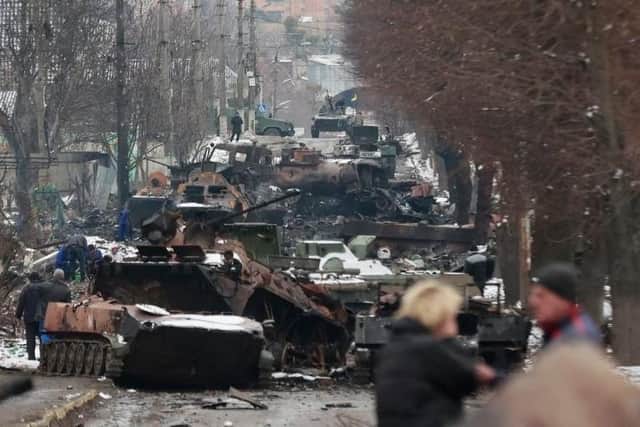 Destruction of streets and discarded tankers.