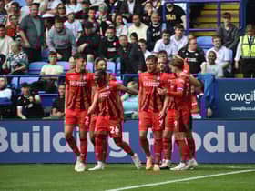 Wigan Athletic claimed a huge derby win over Bolton