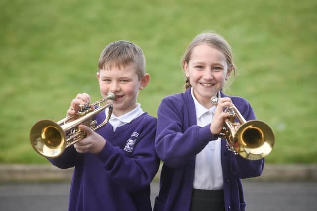 Members of the London Symphony Orchestra take part in a workshop with pupils from Blackpool Primary Schools.  Pictured are year 4 pupils Finley Oliver and Apphia Stacey from Stanley Primary School