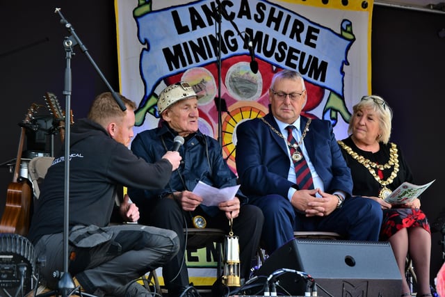 The Mayor of Wigan Coun Marie Morgan, right, and consort Coun Clive Morgan,  second from right, in an interview with former miner Eric.