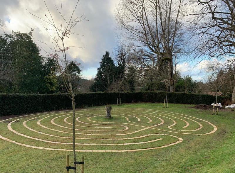 A maze was deemed too difficult for volunteers to maintain; however, the labyrinth will now offer a place for quiet reflection in the park.