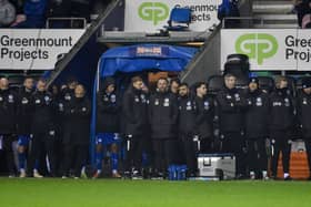 The Latics bench watches on during the penalty shoot-out against Nottingham Forest Under-21s in midweek