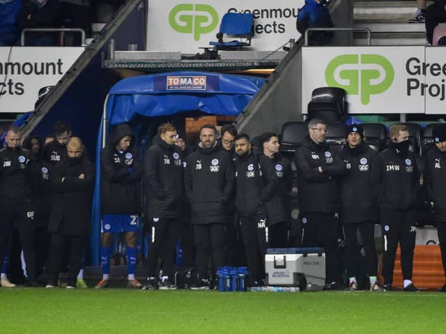 The Latics bench watches on during the penalty shoot-out against Nottingham Forest Under-21s in midweek