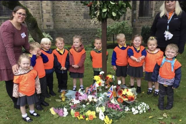 Children from PlayPals visited the church to pay their respects