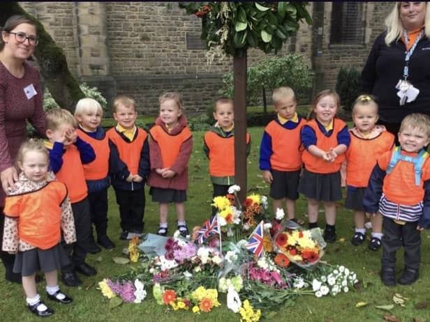 Children from PlayPals visited the church to pay their respects