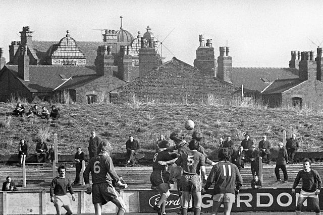 A familiar view for many older fans with Wigan Athletic in action at Springfield Park in 1973 with the top of the Springfield Hotel visible above the terraced houses on Springfield Road.