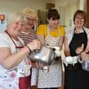 Tea ladies serve up a brew at the artisan market.