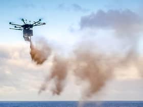 A funeral company is offering to scatter people's ashes over land and sea - via drone