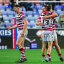 A late drop goal gave Wigan Warriors a narrow victory on Thursday night