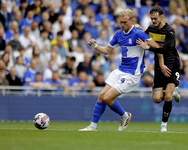 Joe Hugill in action for Latics at Birmingham last season