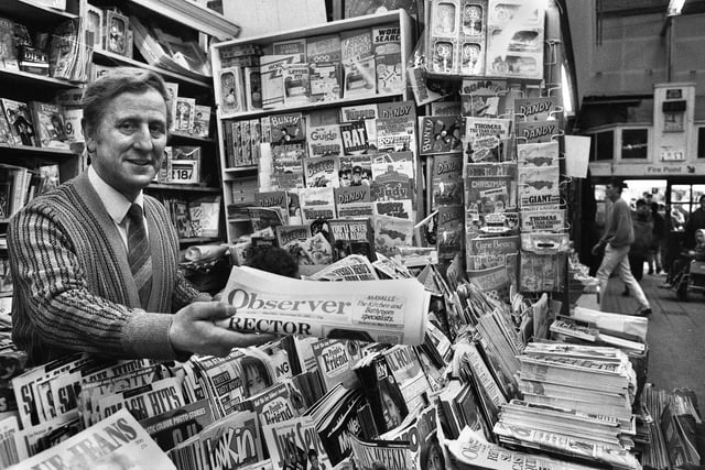 Frank Ryding on his newsagents stall in the old Wigan market hall in December 1987.