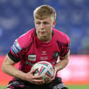Logan Astley in action for Wigan Warriors in 2022