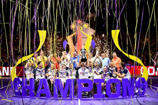 England lift the 2021 Rugby League World Cup trophy after victory over France in the final in Manchester