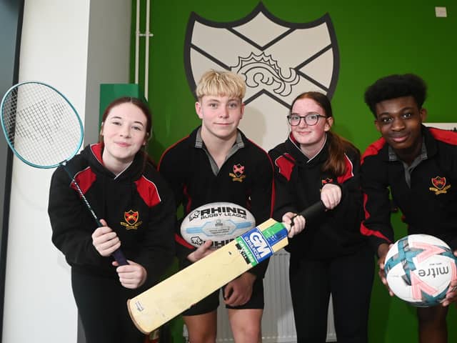 CLASS ACT - Pupils enjoy their new school building and facilities at St John Fisher high school, Wigan.