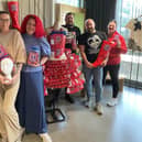 Jess Davies and Lisa Burney, from ReDoo, with Scott Williams and Craig Bourne from Wigan Pride committee and Anita Taulty from Uncle Joe's