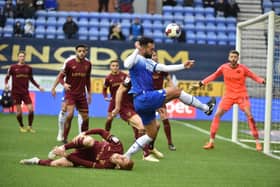 Steven Caulker has hit out at the 'lies' he says Wigan Athletic's players have been told by the club's owners