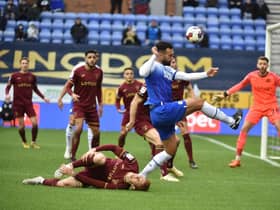 Steven Caulker has hit out at the 'lies' he says Wigan Athletic's players have been told by the club's owners