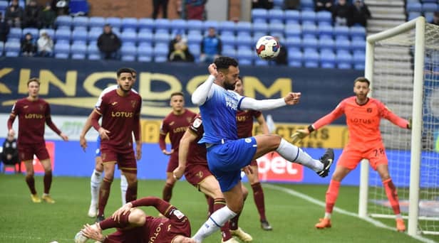 Steven Caulker has hit out at the 'lies' he says Wigan Athletic's players have been told by the club's owners