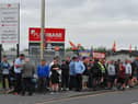 Workers from Pemberton Park and Leisure Homes LTD, Woodhouse Lane, Wigan, on the second day of strike action.