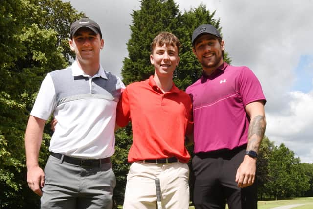 WIGAN - 14-07-22  Wigan Warriors players Harry Smith, left, and Joe Shorrocks,right, showed their support and joined Ethan Prior, 16, for a round, during his charity golf challenge, 100 holes in one day, at Wigan Golf Club, where he is junior captain, raising funds for Derian House childrens hospice.