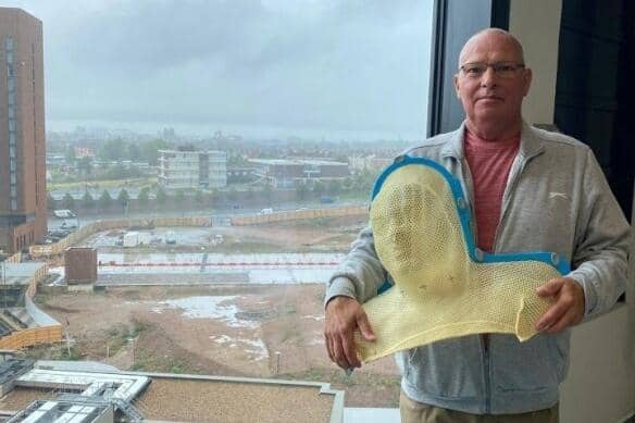 Stuart Keane with the mask he wore while receiving radiotherapy treatment as he battled cancer