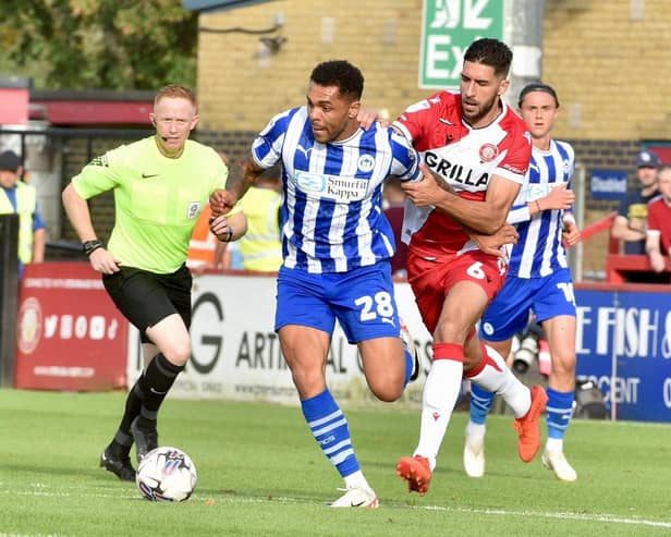 Josh Magennis admits he enjoys international football - but also wishes he was back home to help Latics regroup
