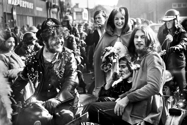 The bride and groom, Kay Chesterton, from Billinge, and Peter Foster, from Up Holland, leave Hope Street Reform Church, Wigan, in a sidecar after their wedding attended by over 50 Hell's Angels on Saturday 17th of March 1973.
