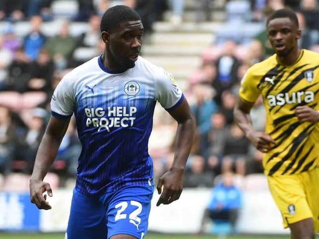 Christ Tiehi was one of a number of Latics players making their final appearances against Rotherham