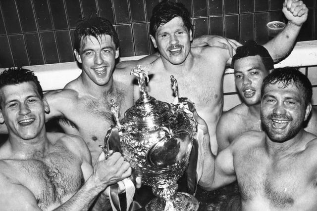Wigan players Ged Byrne, Joe Lydon, Ian Potter, Kevin Iro and Nicky Kiss soak up their victory in the bath with the trophy after beating Halifax in the Challenge Cup Final at Wembley on Saturday 29th of April 1988. Wigan won the match 32-12.